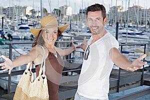 happy couple tourists at port