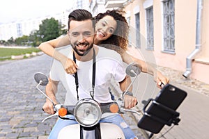 Happy couple traveling on motorcycle.Travel concept