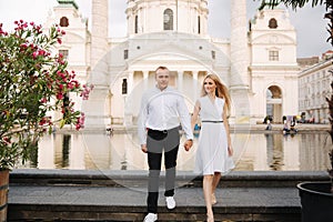 Happy couple walking in the Austria, Viena. They love each other and spent time together