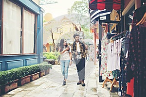 Happy couple walking in urban ,Young adults tourists on travel urban walking together. Couple travel