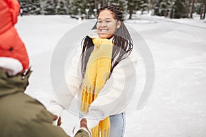 Happy couple walking in winter