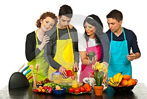 Happy couples cooking together