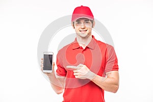 Happy courier with phone looking at camera isolated white background