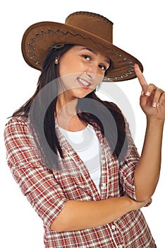 Happy cowgirl with brown hat