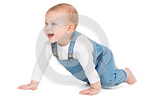 Happy crawling Baby Side view over White. Laughing Active Child study to crawl. Babies Development and Growth. Playful little Kid