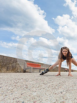 Happy crazy woman wearing roller skates