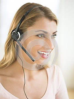 Happy Customer Service Representative Looking Away