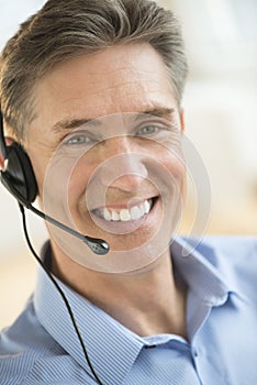Happy Customer Service Representative Wearing Headset