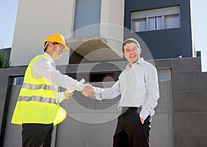 Happy customer smiling and constructor foreman worker handshake agreement in real state business