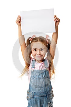 Happy cute child girl holding empty blank