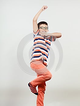 Happy cute kid little boy jumping. Happiness.