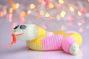 Happy cute knitted snake