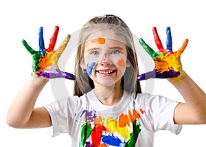 Happy cute little girl with colorful painted hands