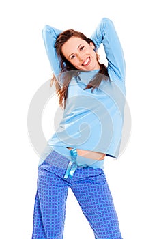 Happy cute woman in blue pyjamas