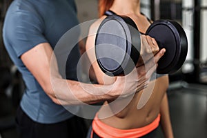 happy cutie athletic girl , execute exercise in sport-hall