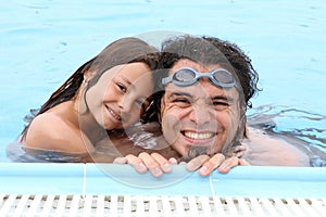 Happy dad father and child in pool