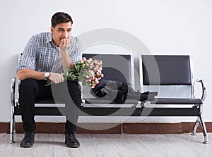 Happy dad waiting for news in maternity house