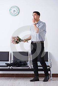 Happy dad waiting for news in maternity house