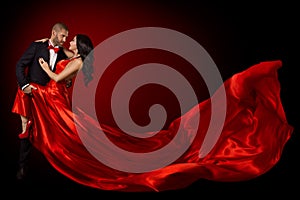 Happy Dancing Couple Portrait, Woman in Red Silk Gown and Handsome Beard Man in Suit, Flying Waving Fabric