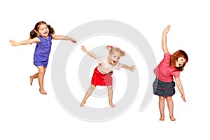 Happy dancing kids. Isolated on white