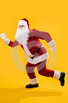 Happy dancing Santa Claus doing a version of a walking man move