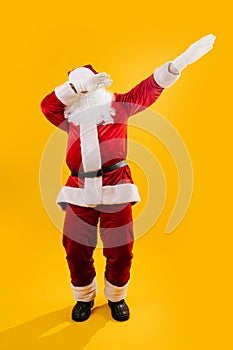 Happy dancing Santa Claus squating and waving hands