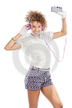 Happy, dancing and woman portrait of a model with music, phone radio and web song. White background, black woman and