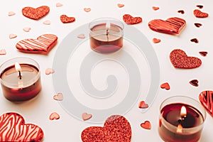 Happy days background. Red love hearts, romantic gift box, Valentines day candle on white table. Romantic message template with