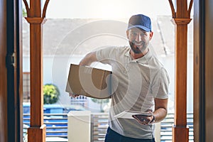 Happy delivery man, box and portrait in logistics, parcel or courier service with tablet at front door. Male person