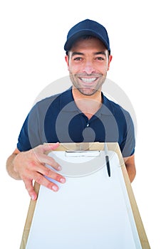 Happy delivery man with package and clipboard