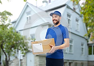 Happy delivery man with parcel box