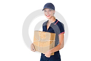 Happy delivery woman holding cardboard box