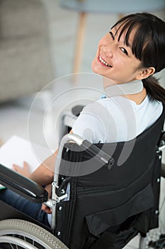 Happy disabled woman smiling at camera