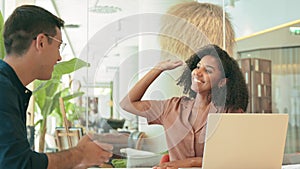 Happy diverse business team man and woman giving high five at work in office.