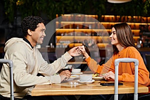 happy diverse couple enjoying a delicious