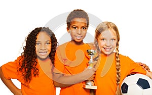 Happy diverse kids winners of soccer games