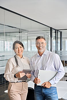 Happy diverse professional business man and woman team in office, portrait.