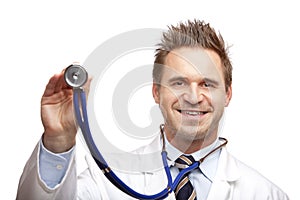 Happy doctor holding stethoscope for examination