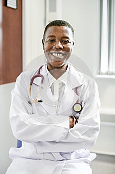 Happy doctor at a hospital photo