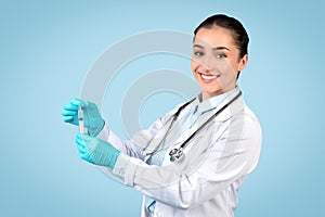 Happy doctor preparing syringe, medical procedure