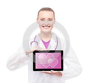 Happy doctor with a tablet and hearts on it. Child expectance an
