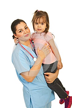 Happy doctor woman holding toddler