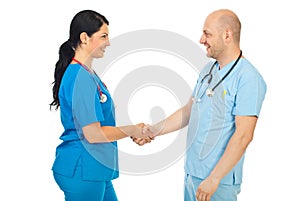 Happy doctors handshake