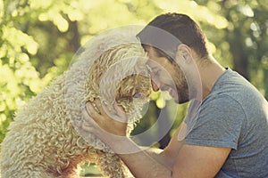 Happy dog and his owner