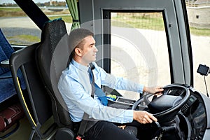 Happy driver driving intercity bus