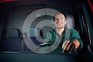 Happy Driver holding wheel