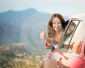 Happy driver woman on summer vacation