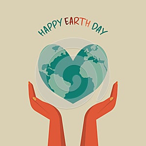 human hands holding heart shape planet for earth day