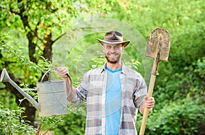 Happy earth day. Eco living. Eco farm. Harvest. sexy farmer hold shovel and watering can. farming and agriculture