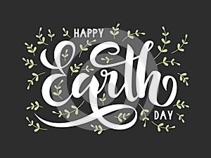 Happy Earth Day poster.  22 April. Lettering. Green leaves on grey background.